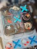 Handmade resin noughts and crosses game
