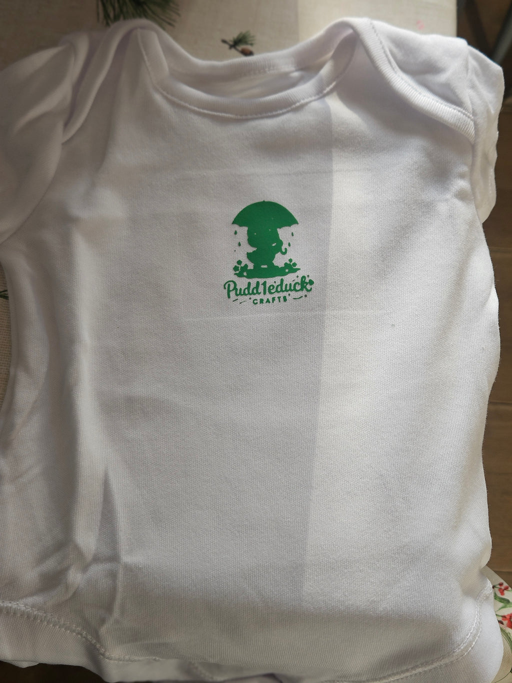 New logo'd baby vests with brand name
