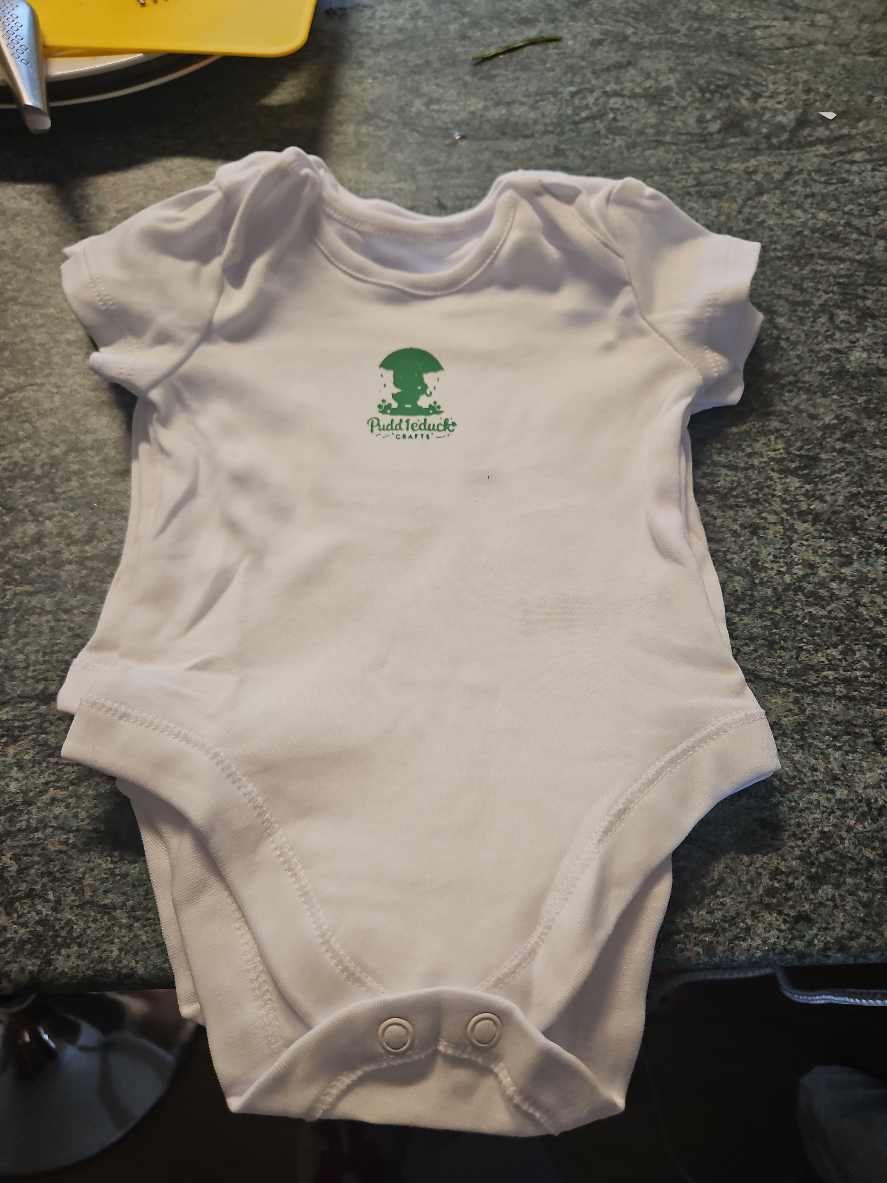 New logo'd baby vests with brand name